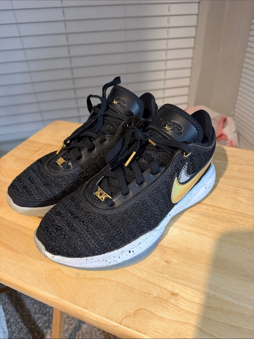 Nike Kids Black Sneakers with Gold Swoosh